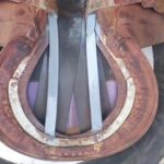 Soudure et peinture de protection sur barre de renfort d'arçon